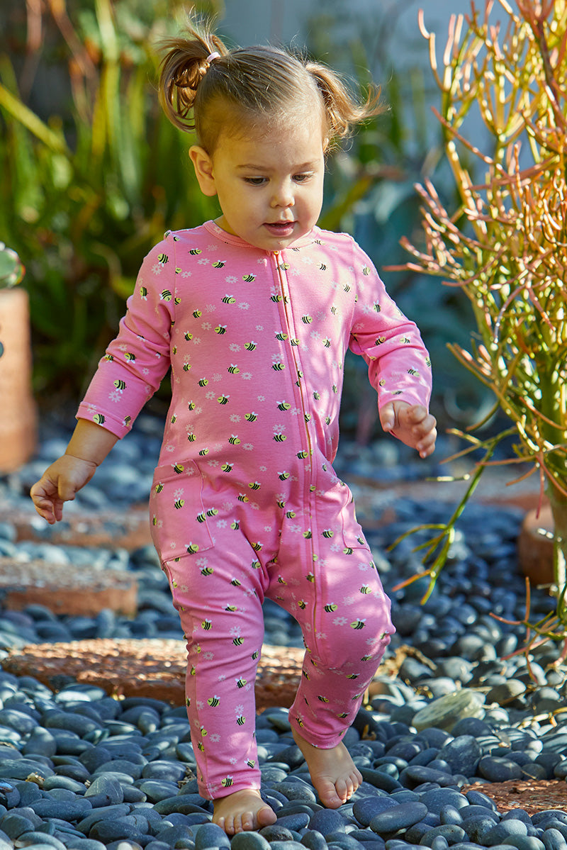 Baby girl in baby girl's long sleeve everyday romper in cute as can bee|cute-as-can-bee