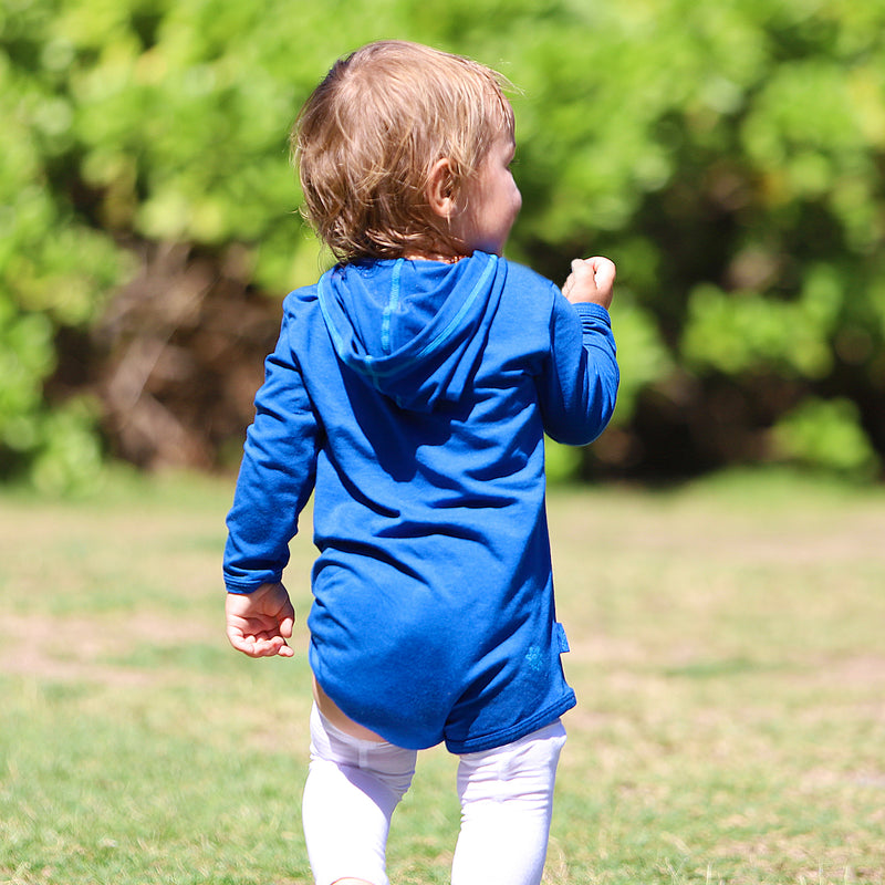 Baby Boy Walking in the Sun Outside in the Yard in the Baby Boy's Hooded Sunzie|navy-blue