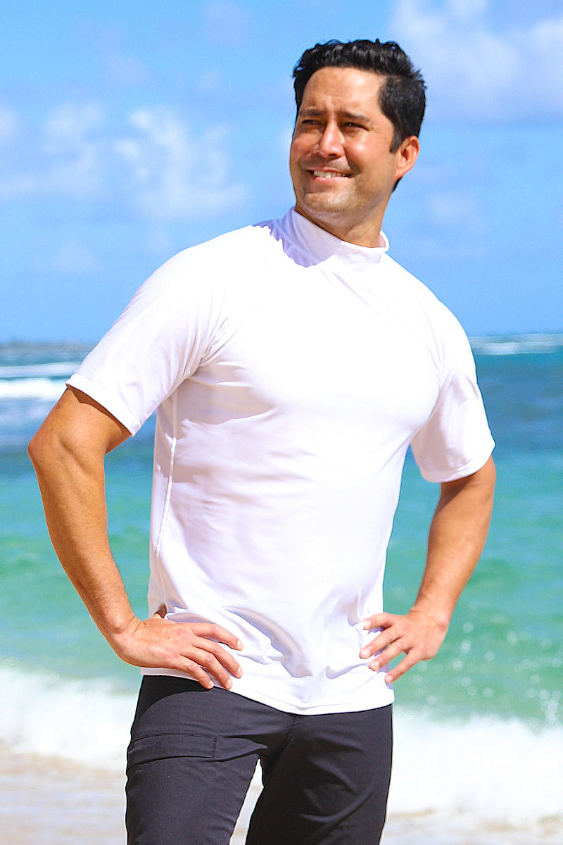 Man in UV Skinz's men's short sleeve swim shirt in white|white