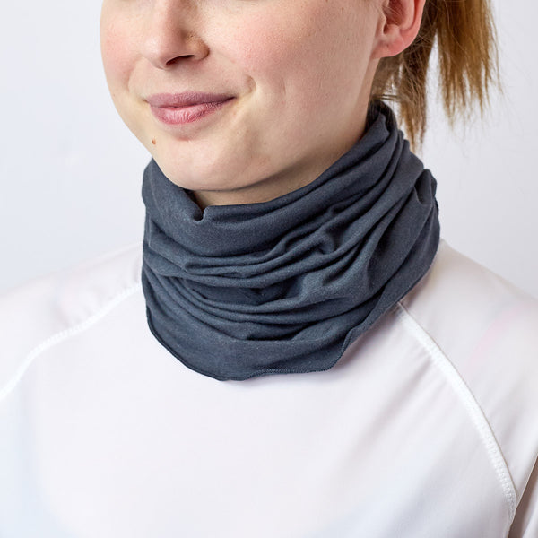 Woman wearing a grey UPF neck shield