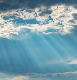 Rays of sunlight on a cloudy day