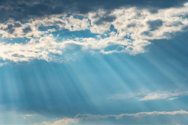 Rays of sunlight on a cloudy day