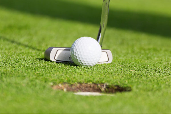 Golf club and a golf ball