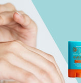 woman putting sunscreen on 