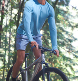 man cycling in UPF clothing
