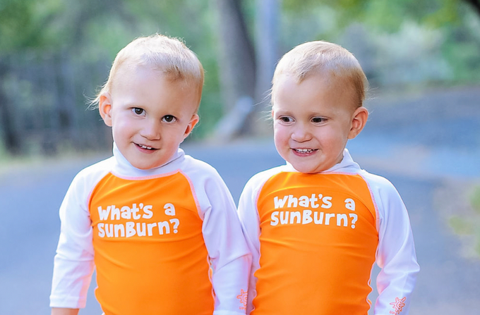 Babies in UV Skinz's What's a Sunburn Swim Shirt for Skin Cancer Awareness Month