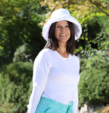 woman in UPF 50+ gardening clothes