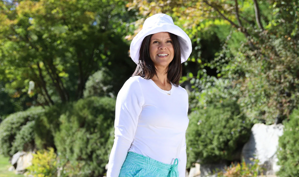 woman in UPF 50+ gardening clothes