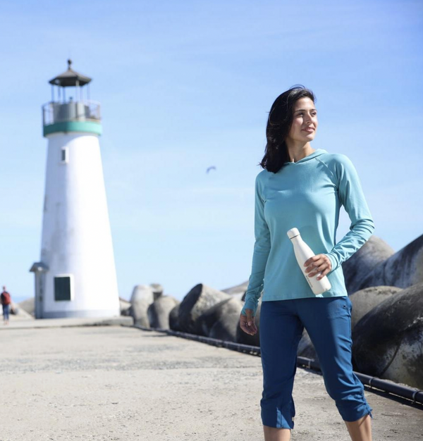 woman in UPF athleisure wear outside