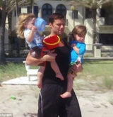 Ricky Martin with his kids wearing UV Skinz