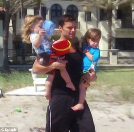 Ricky Martin with his kids wearing UV Skinz