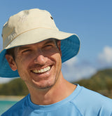 Man wearing a UV Skinz's bucket hat