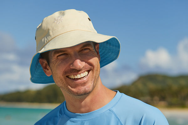Man wearing a UV Skinz's bucket hat