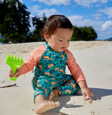 Baby in UV Skinz's sun protective swimwear