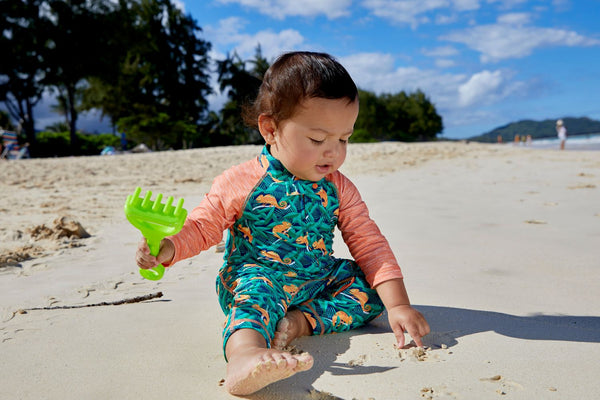 Baby in UV Skinz's sun protective swimwear