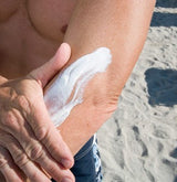 Man applying sunscreen