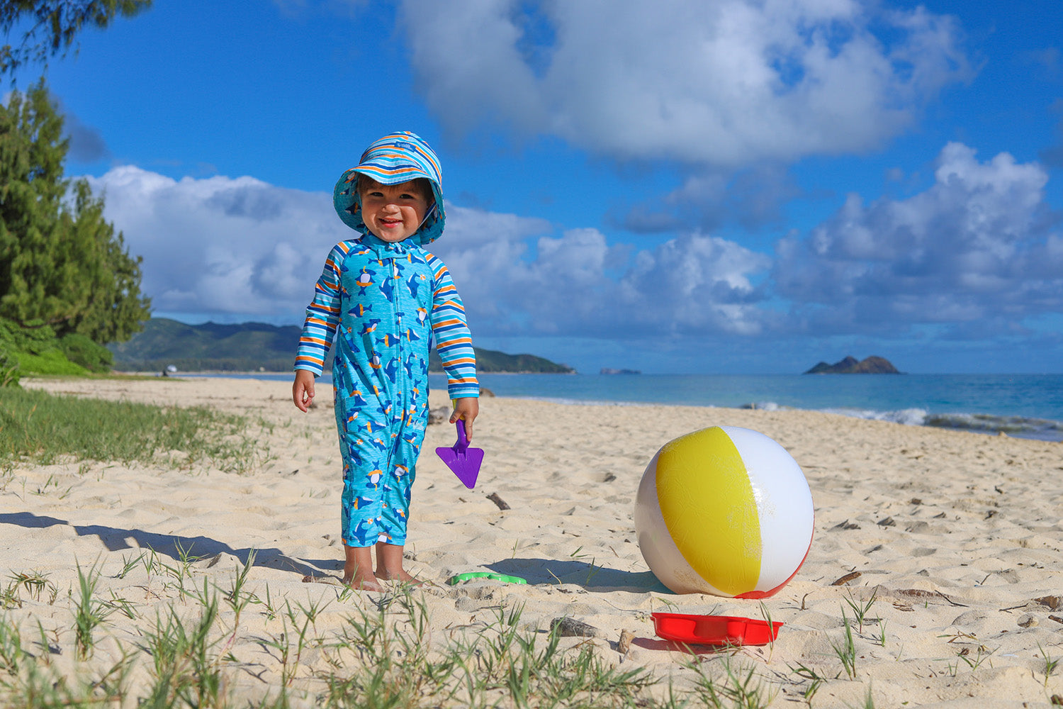 Baby in a UV Skin'z sun hat