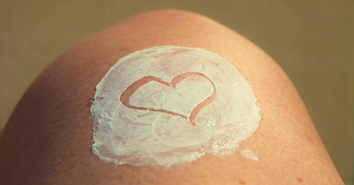 sunscreen on a woman's knee