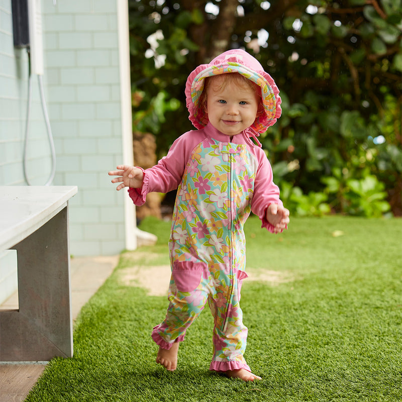 baby girl in sun & swim suit|playtime-garden
