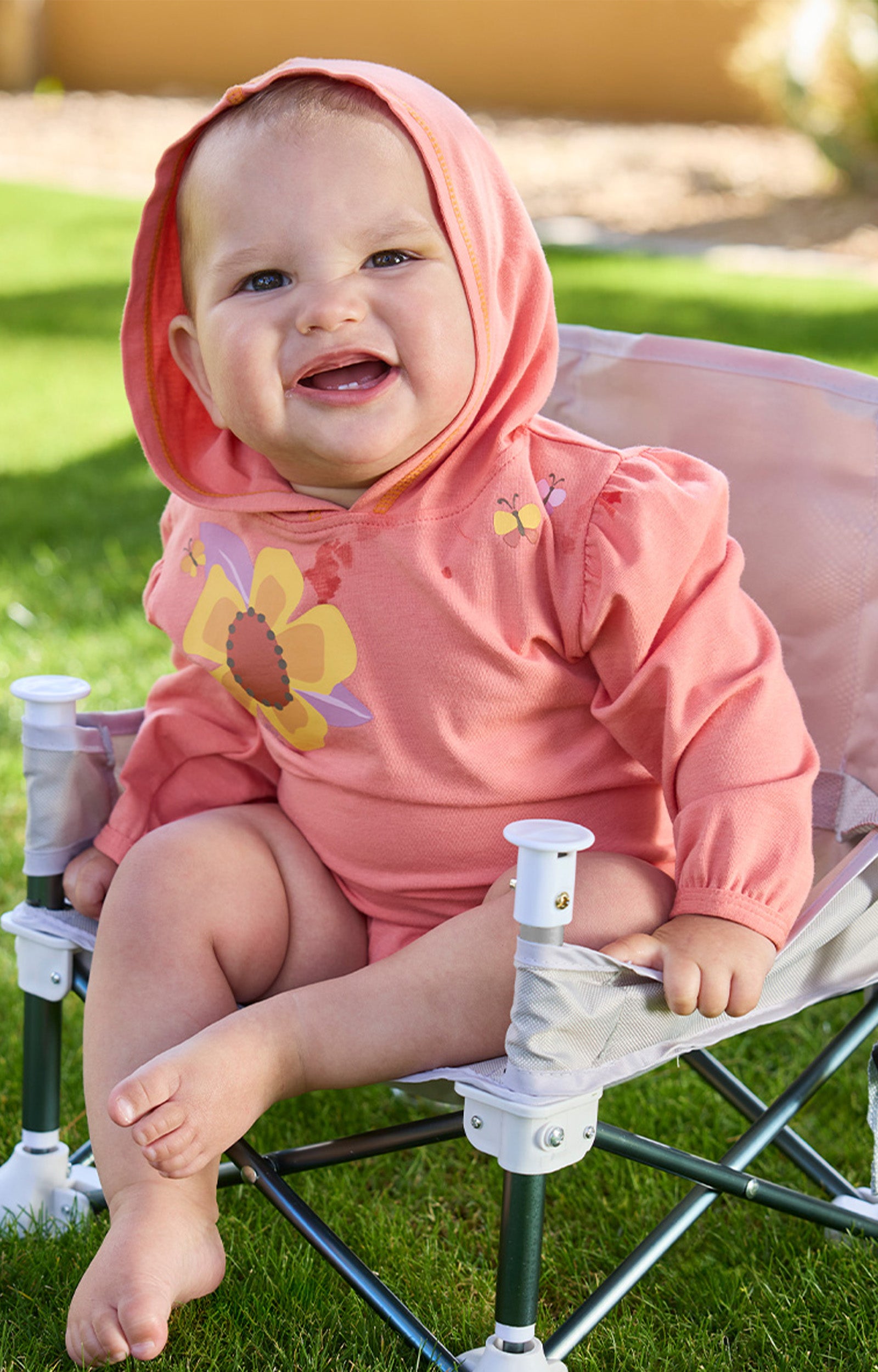 baby girl sitting in chair in hooded sunzie|butterfly-garden