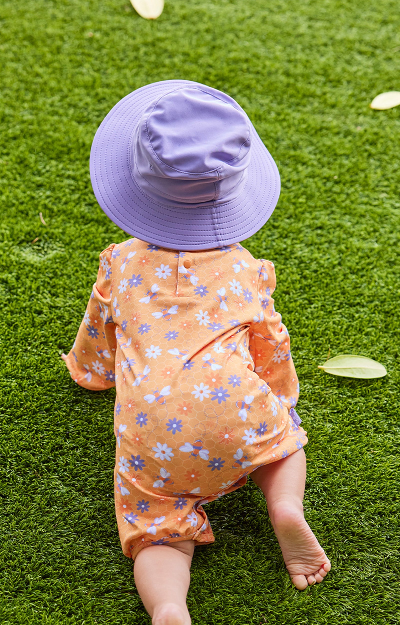 baby girl crawling in uv sunzie|bubbly-bees