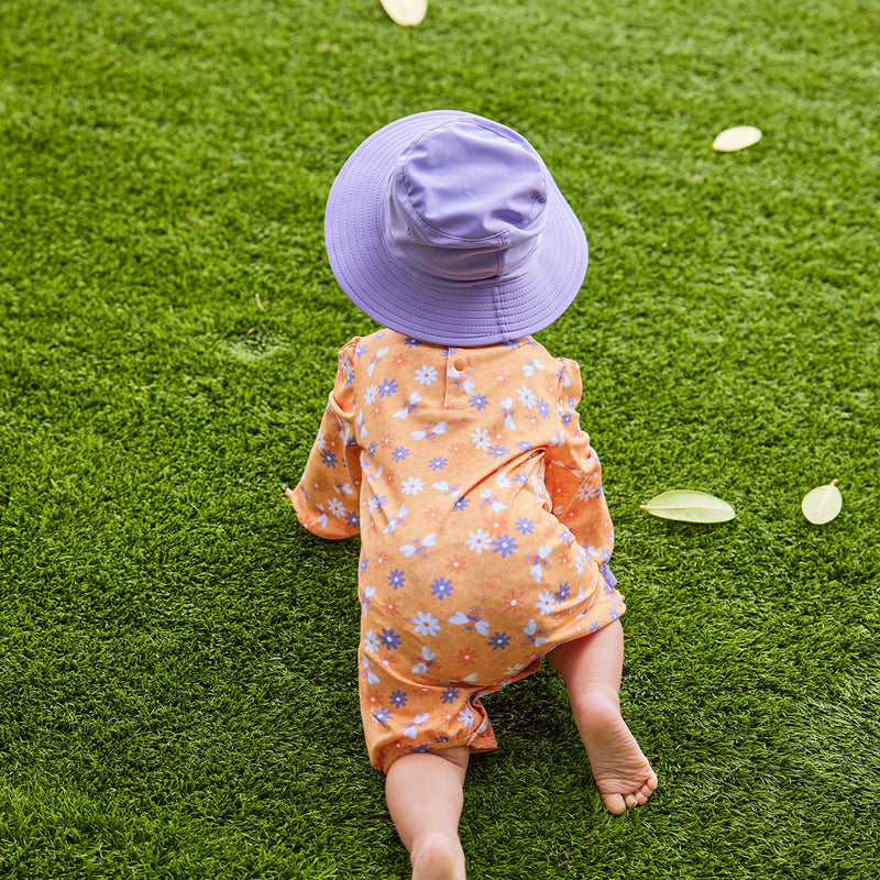 baby girl in swim hat|daybreak