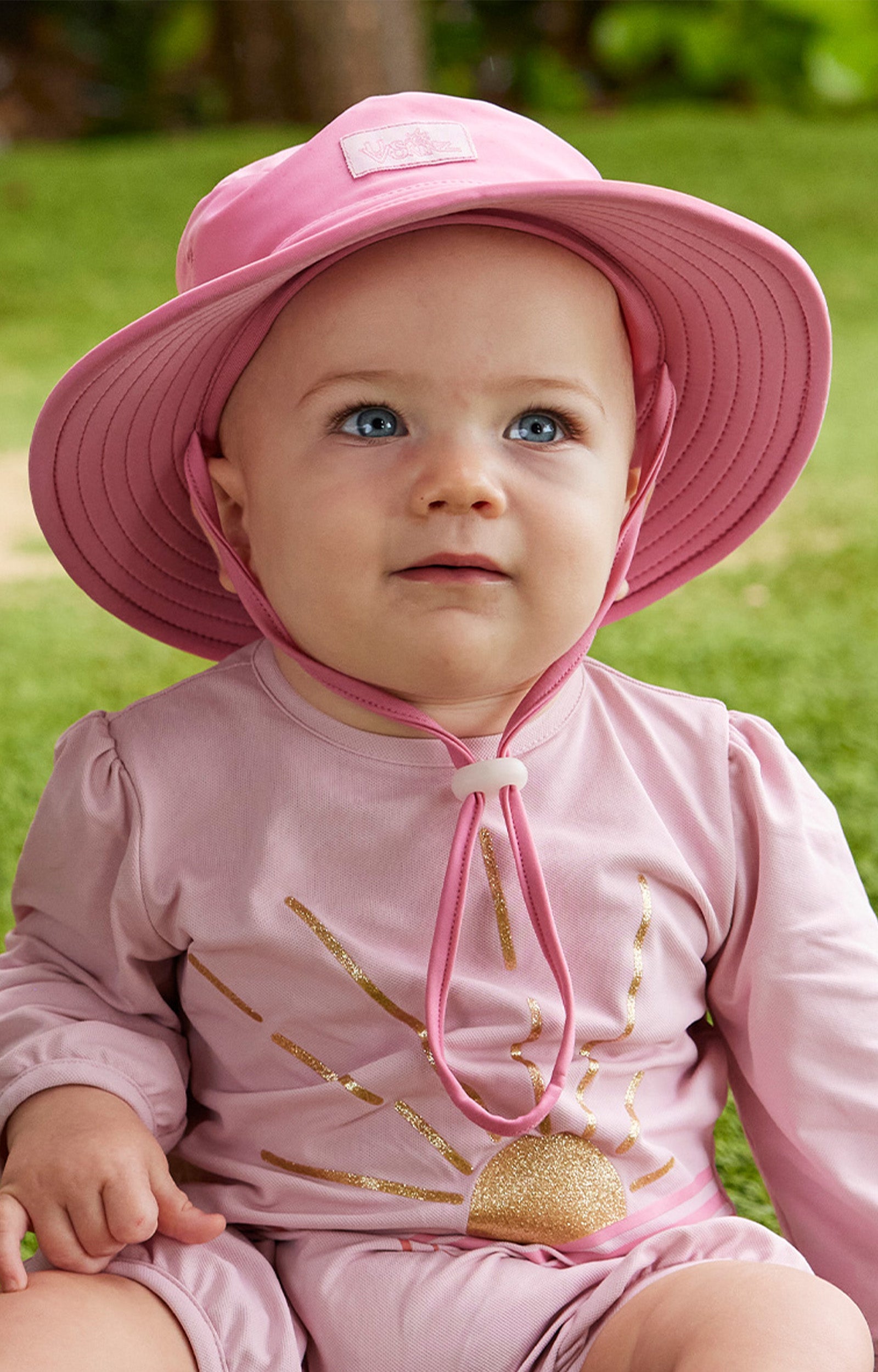 baby girl in swim hat|wild-rose