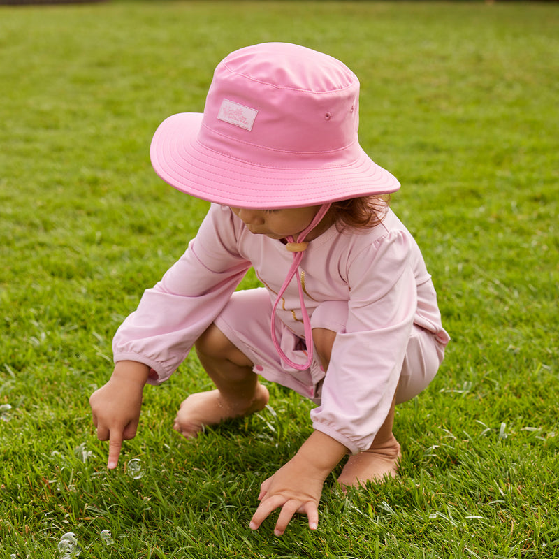 baby girl in swim hat|wild-rose