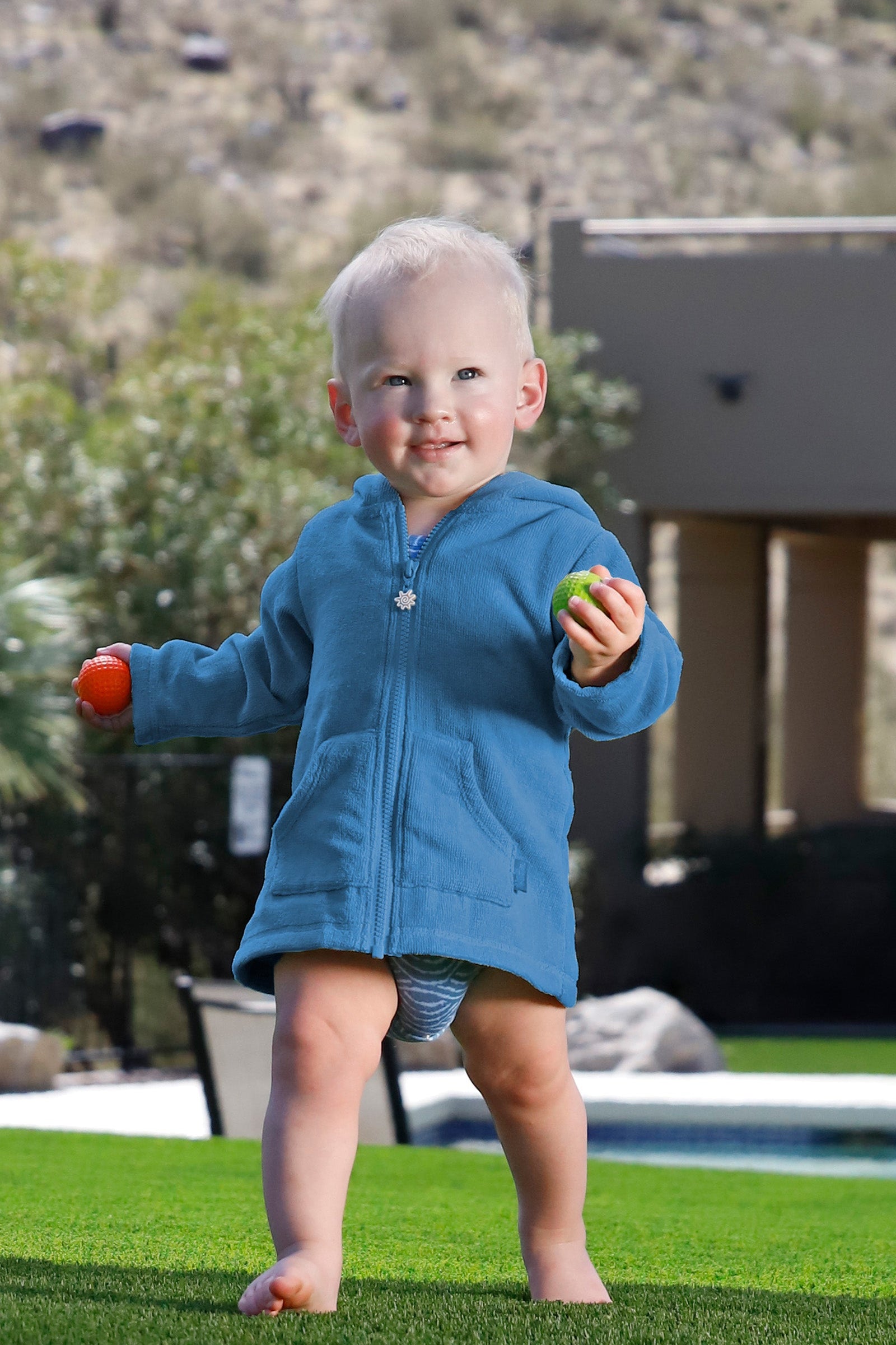 baby in hooded terry beach cover up|baltic
