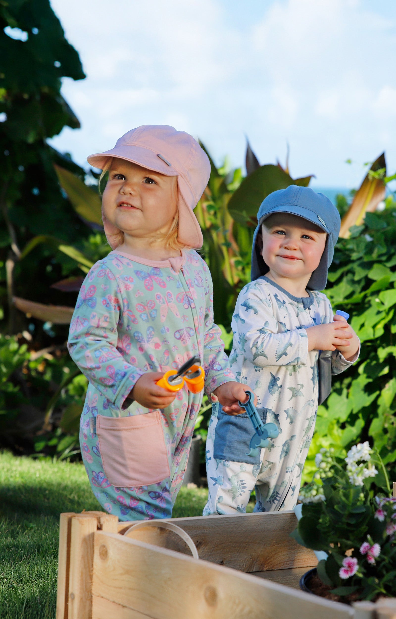 babies in everyday romper in garden in butterflies and watercolor dinos|watercolor-dinos