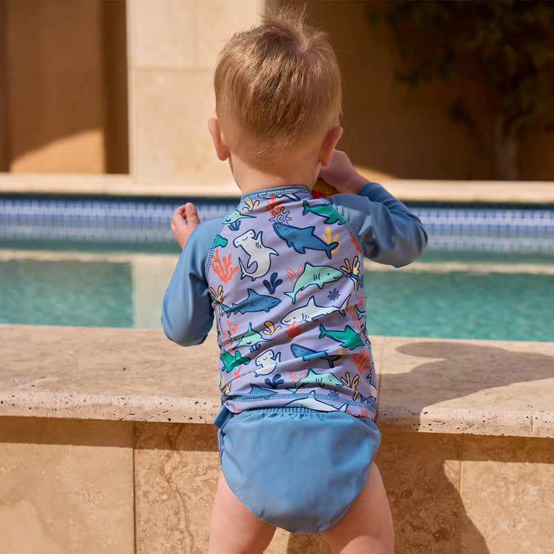 baby boy playing by pool in adjustable swim diaper|baltic