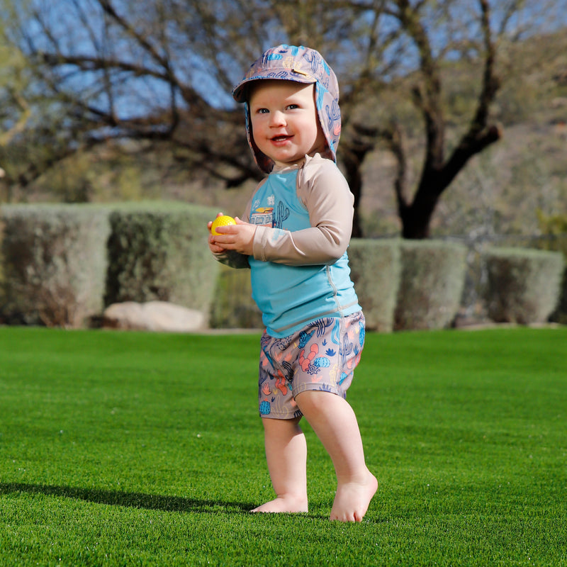 baby in baby zippy long sleeve swim shirt in desert road trip|desert-road-trip