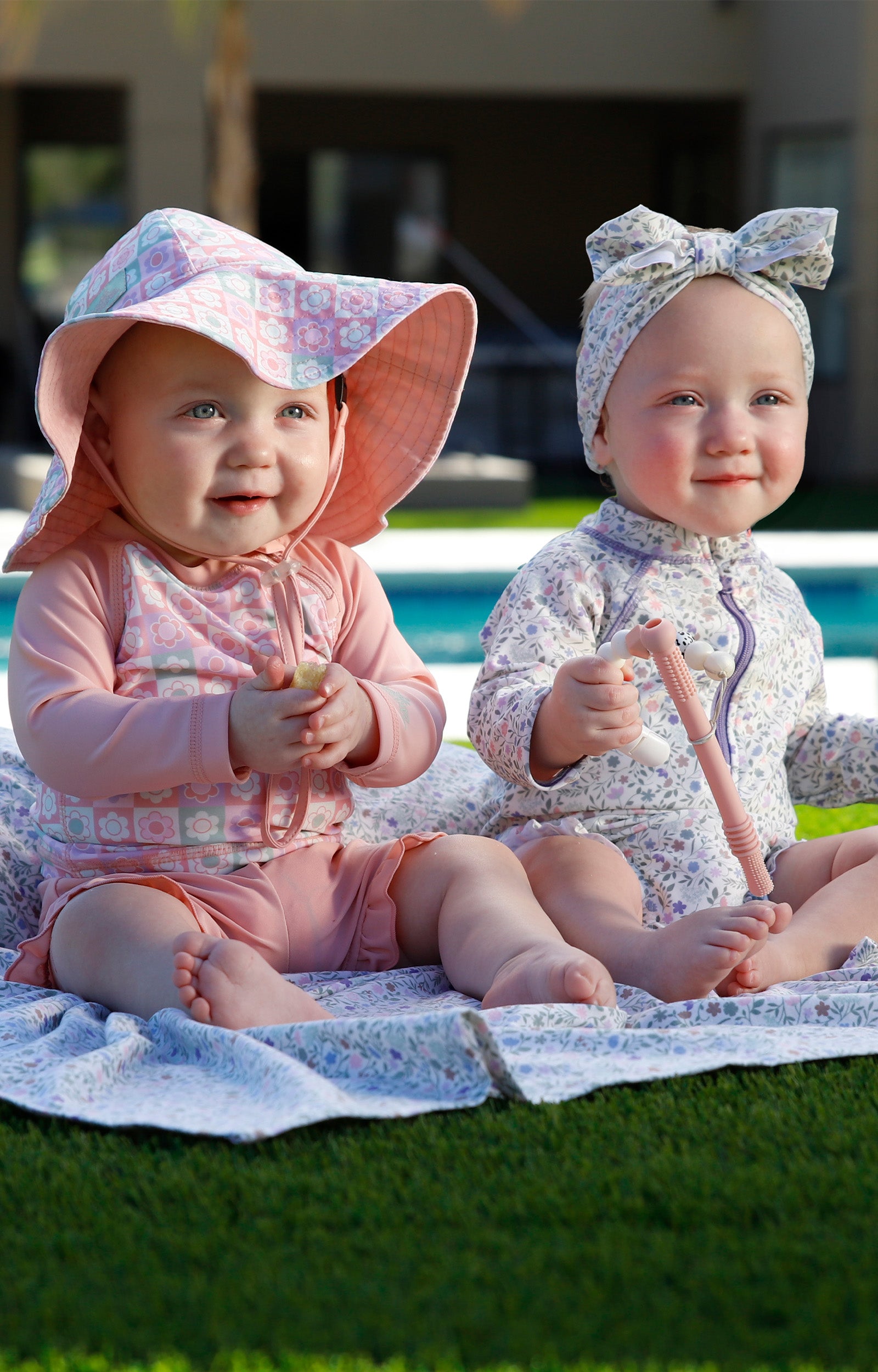 baby in long sleeve zippy sun and swim suit|tiled-flowers