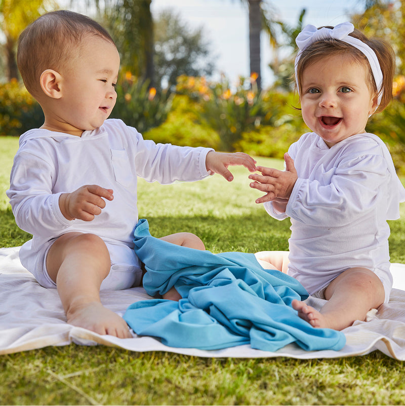 Babies Playing on UV Skinz's My First Sun Blanket™ in Oatmeal Jaspe|oatmeal-jaspe