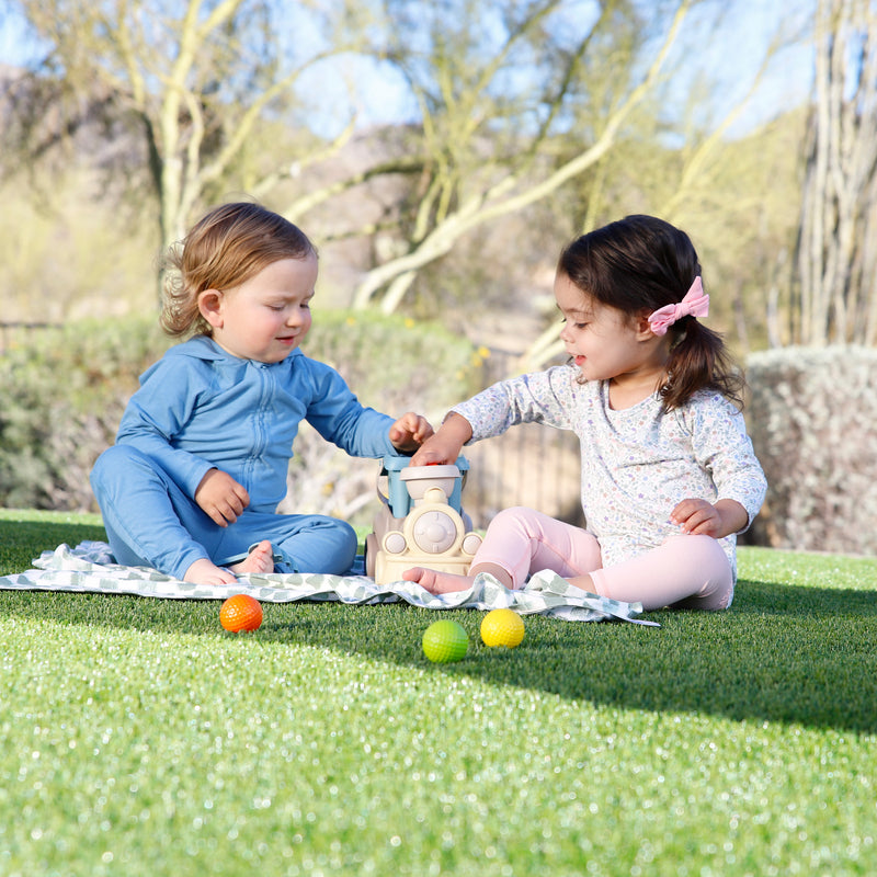 babies playing on my first sun blanket|painted-checkers
