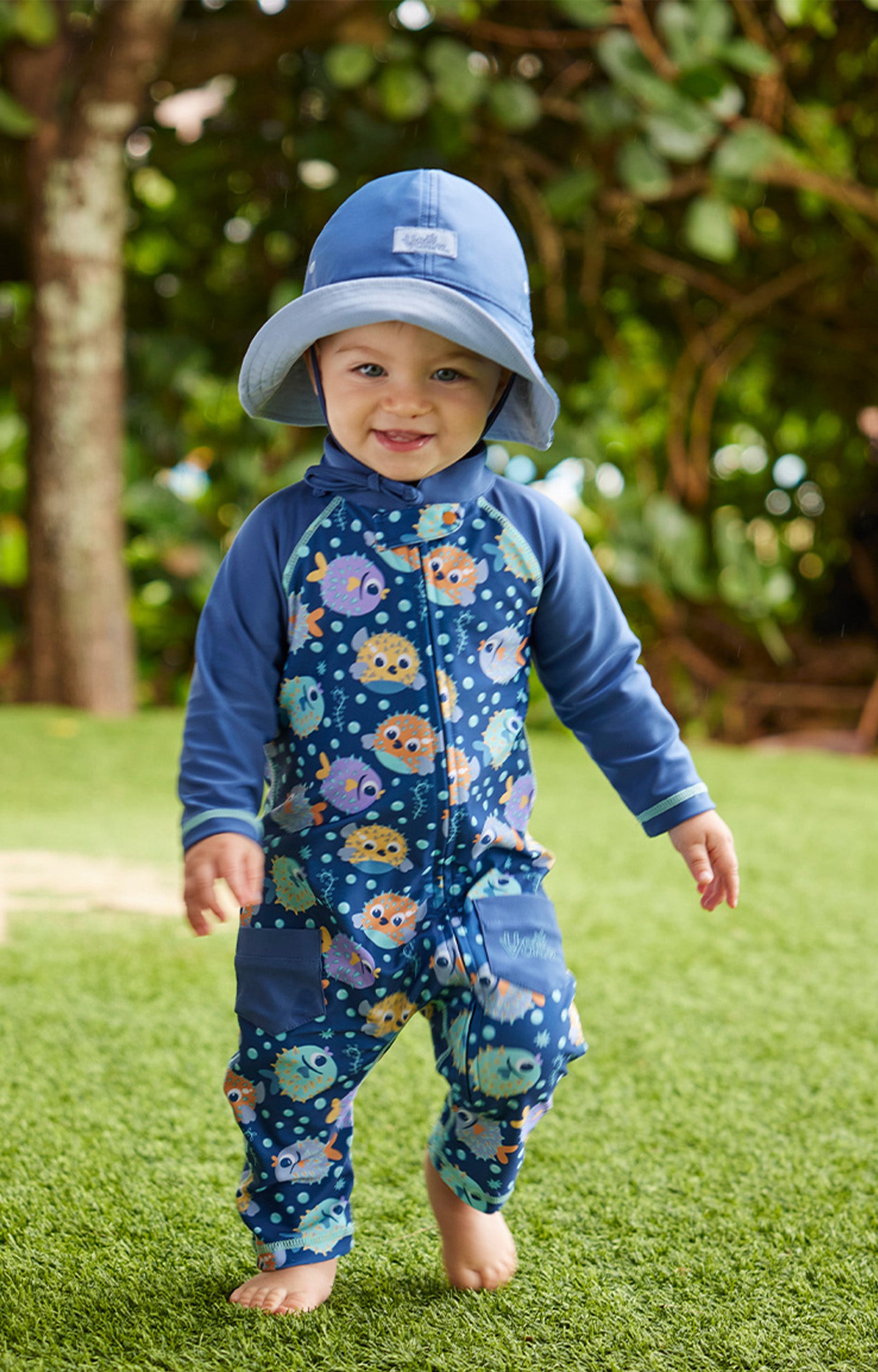 baby boy running in sun & swim suit|bubble-fishies