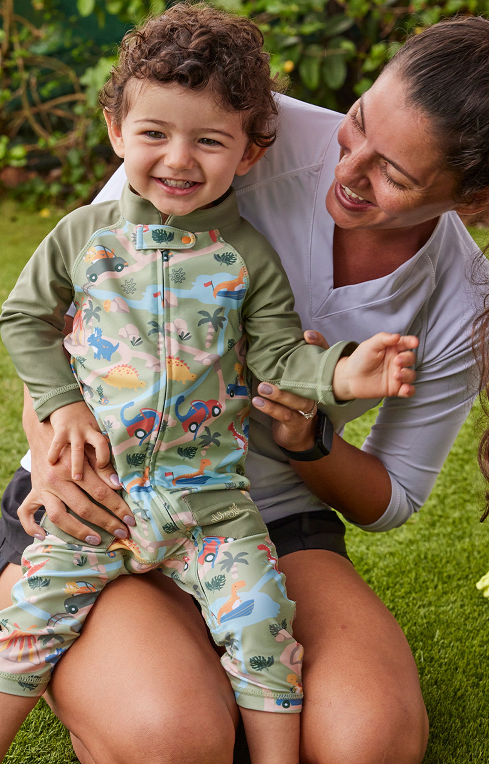 baby boy with his mom in sun & swim suit|dinoville