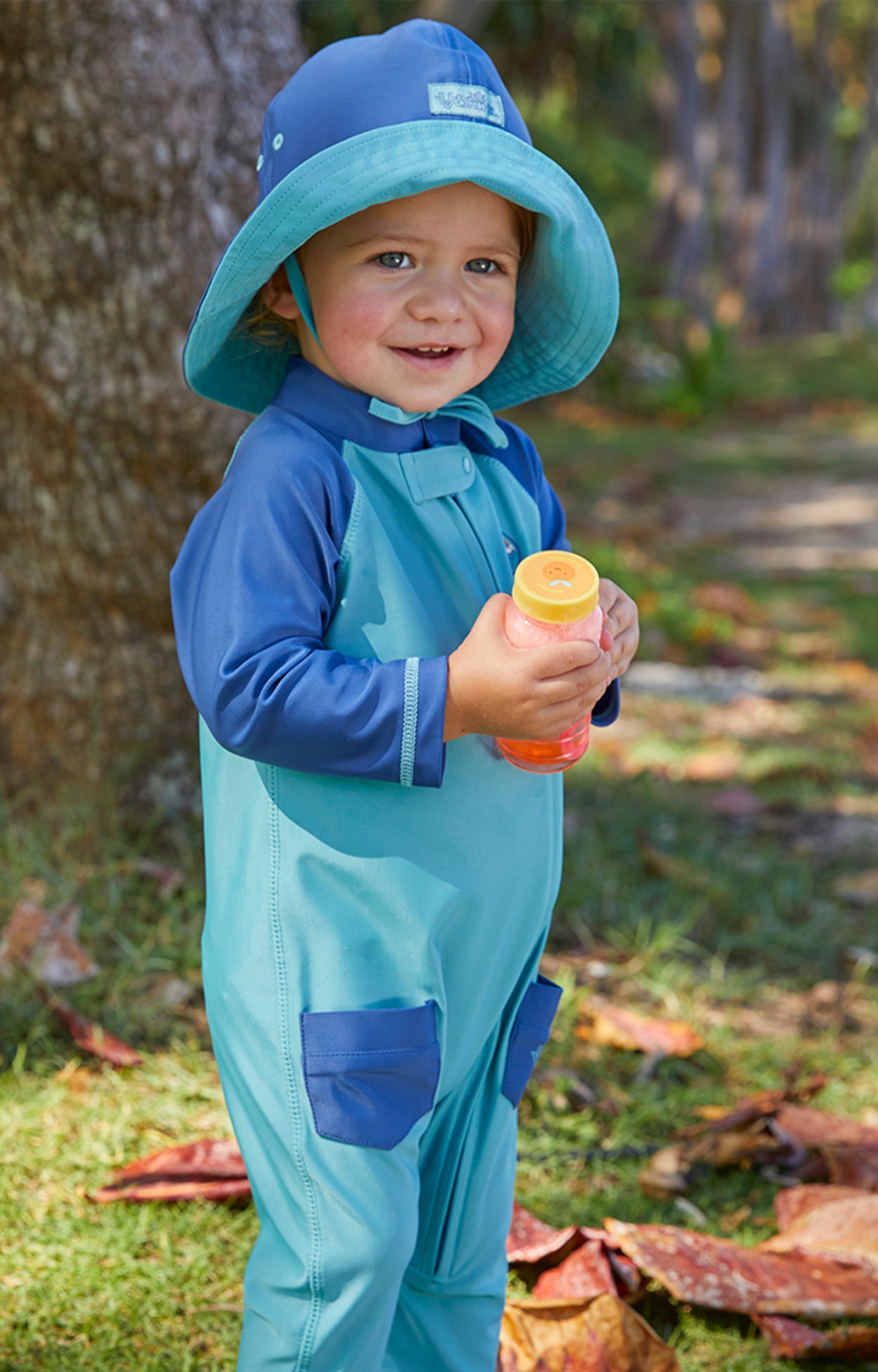 Baby in UV Skinz's baby boy's long-sleeve swimsuit in endless summer|endless-summer