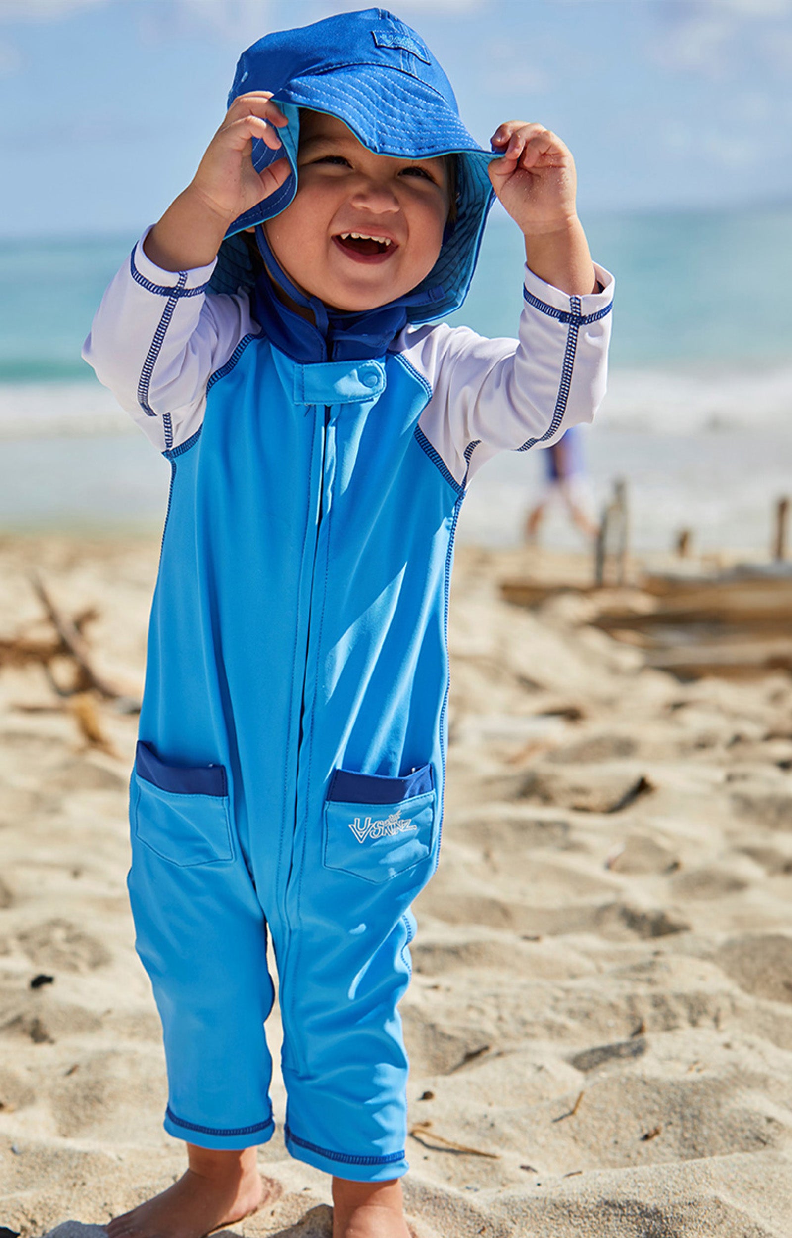 Baby boy in UV Skinz's baby boy's long-sleeve swimsuit in ocean blue white|ocean-blue-white