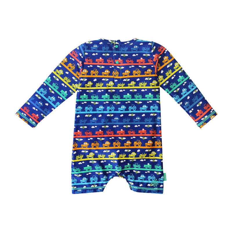 back of the baby boy's UV onesie in rainbow tiny trucks|rainbow-tiny-trucks