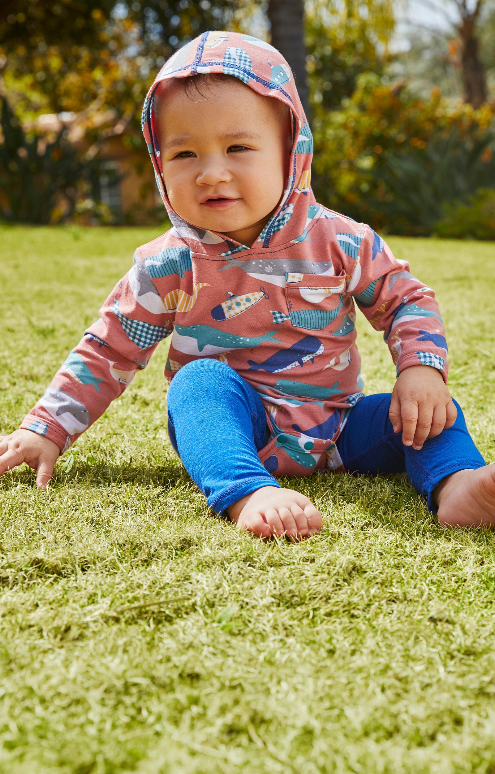 Baby in UV Skinz's hooded sunzie|fish-friends
