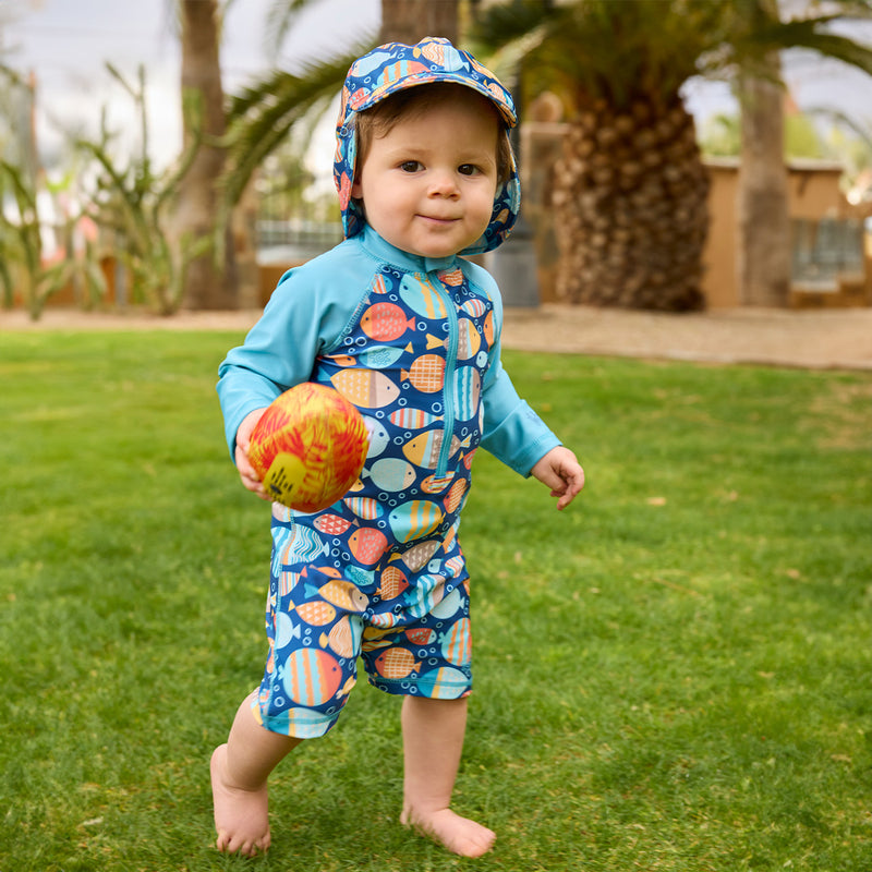 baby boy running in swim flap hat|fish-parade