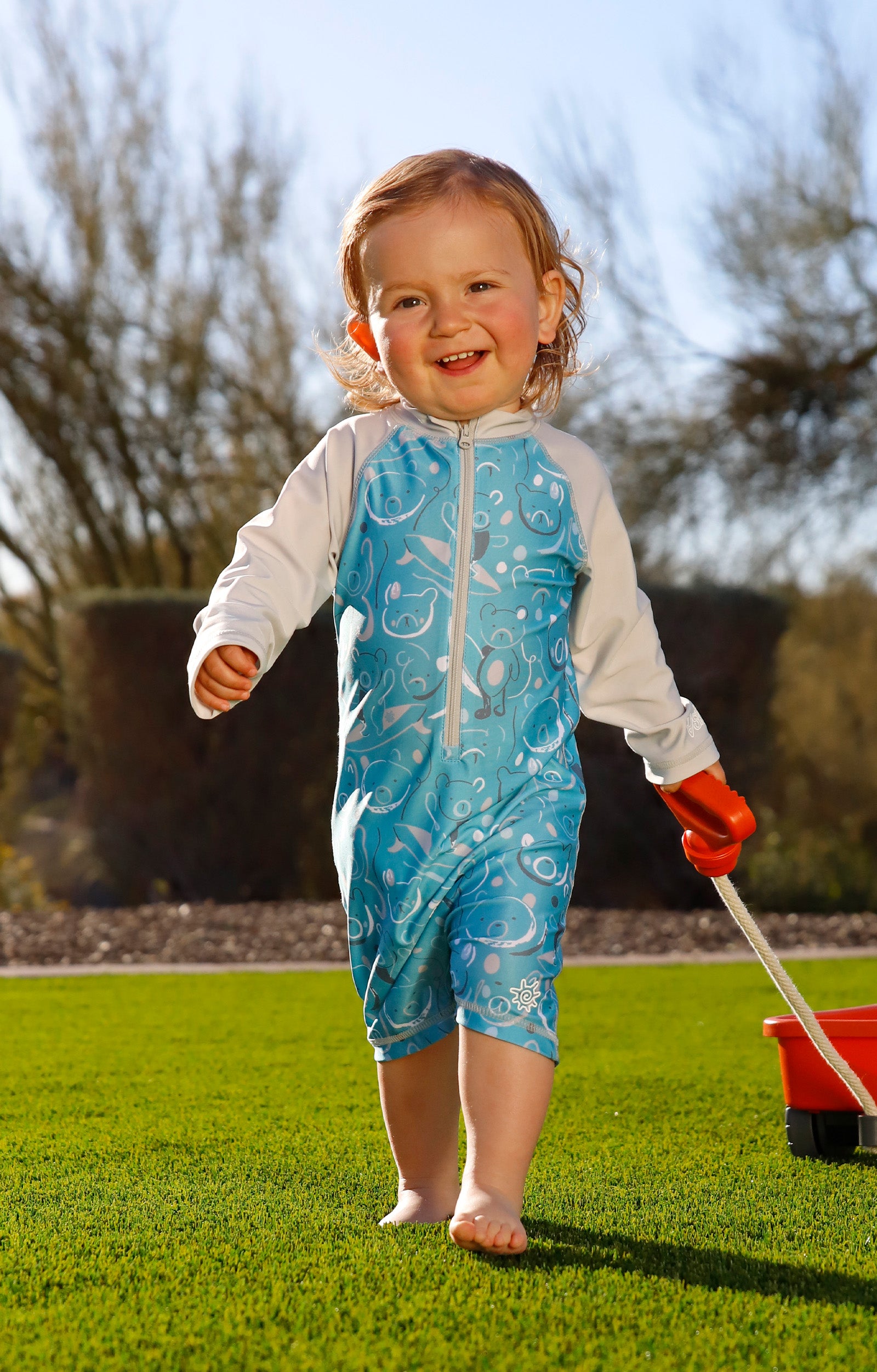 baby in long sleeve swim romper|surfing-bears