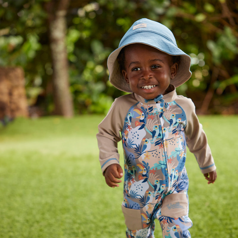 baby boy in reversible sun hat|baltic-sandstone