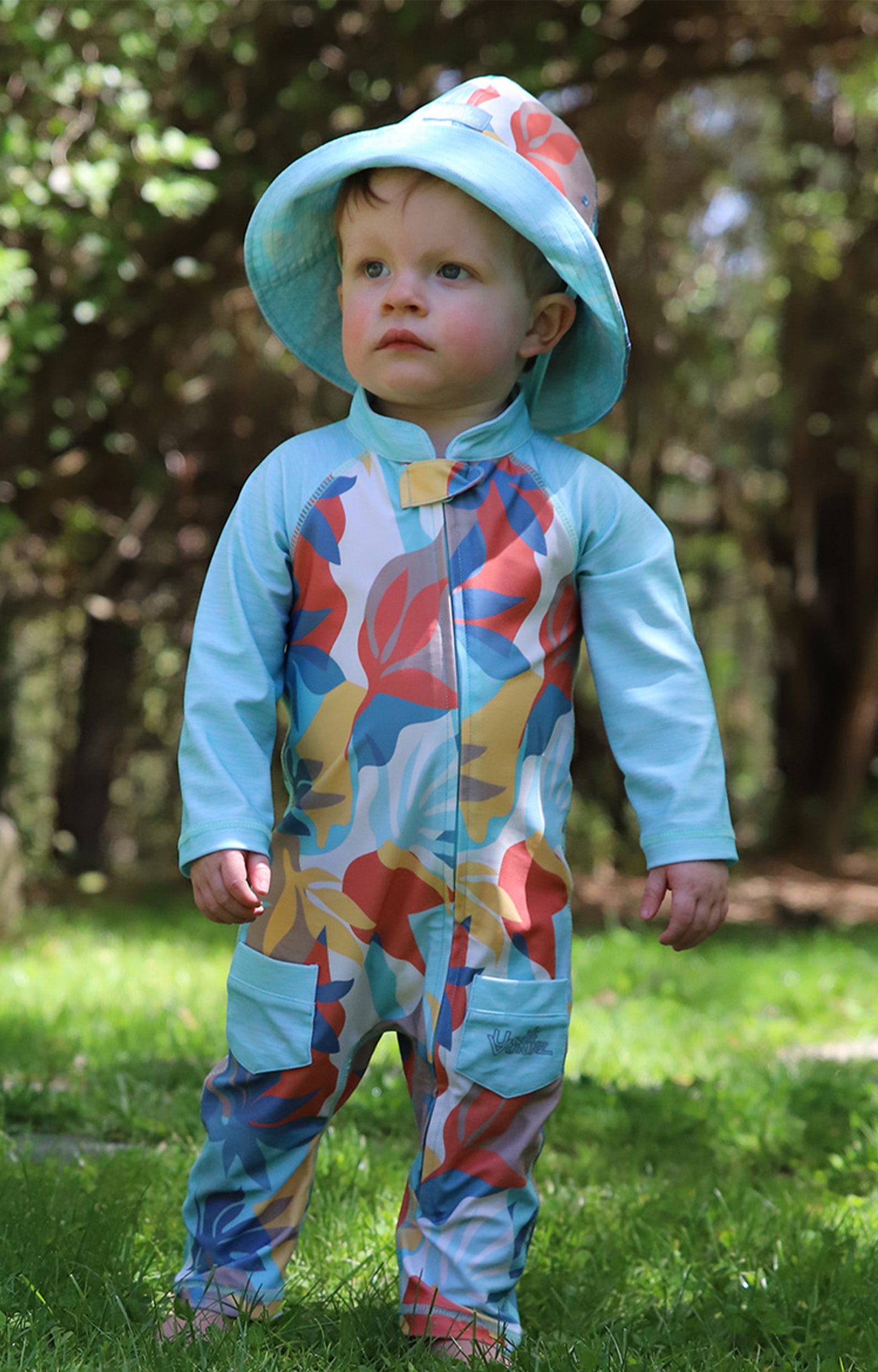 baby in reversible sun hat|beach-picasso