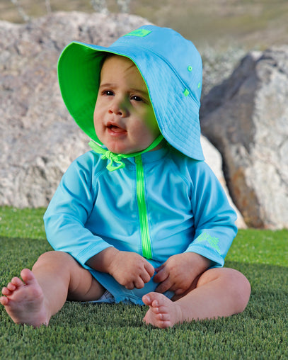 baby in reversible sun hat|neon-sky-neon-green
