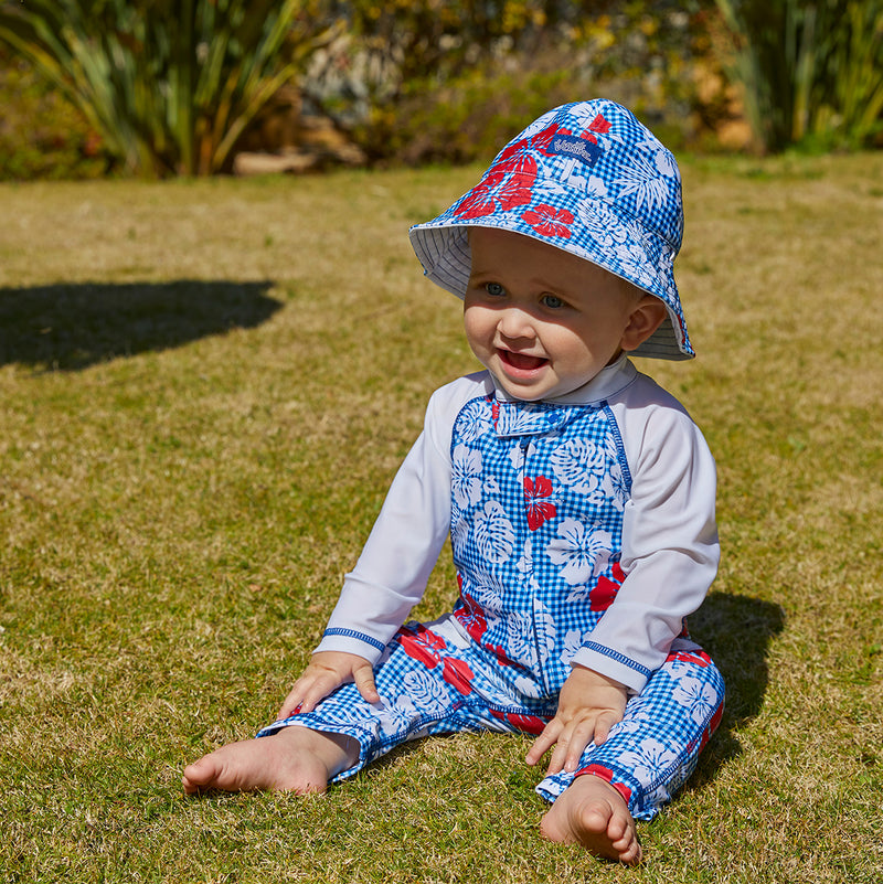 Baby in UV Skinz's baby boy's sun hat in red americana gingham|red-americana-gingham