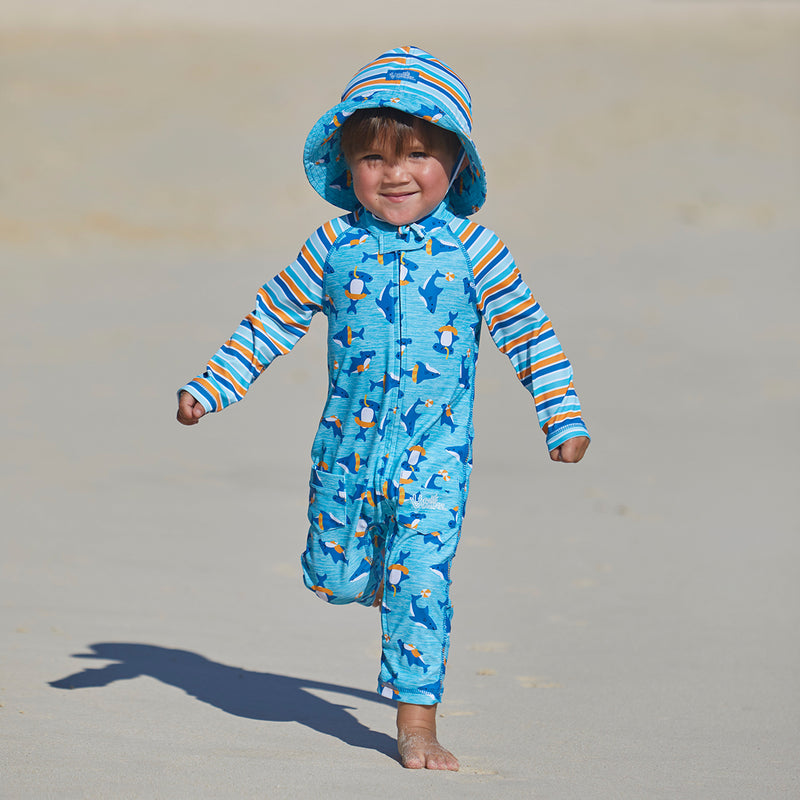 Baby boy in UV Skinz's reversible sun hat in sea party sharks|sea-party-sharks