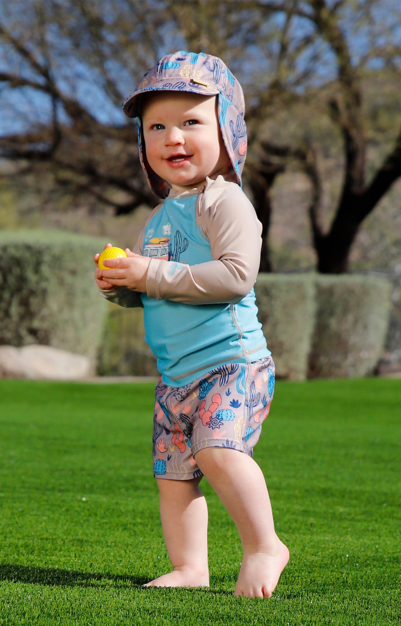 baby in swim flap hat|cactus-crowd