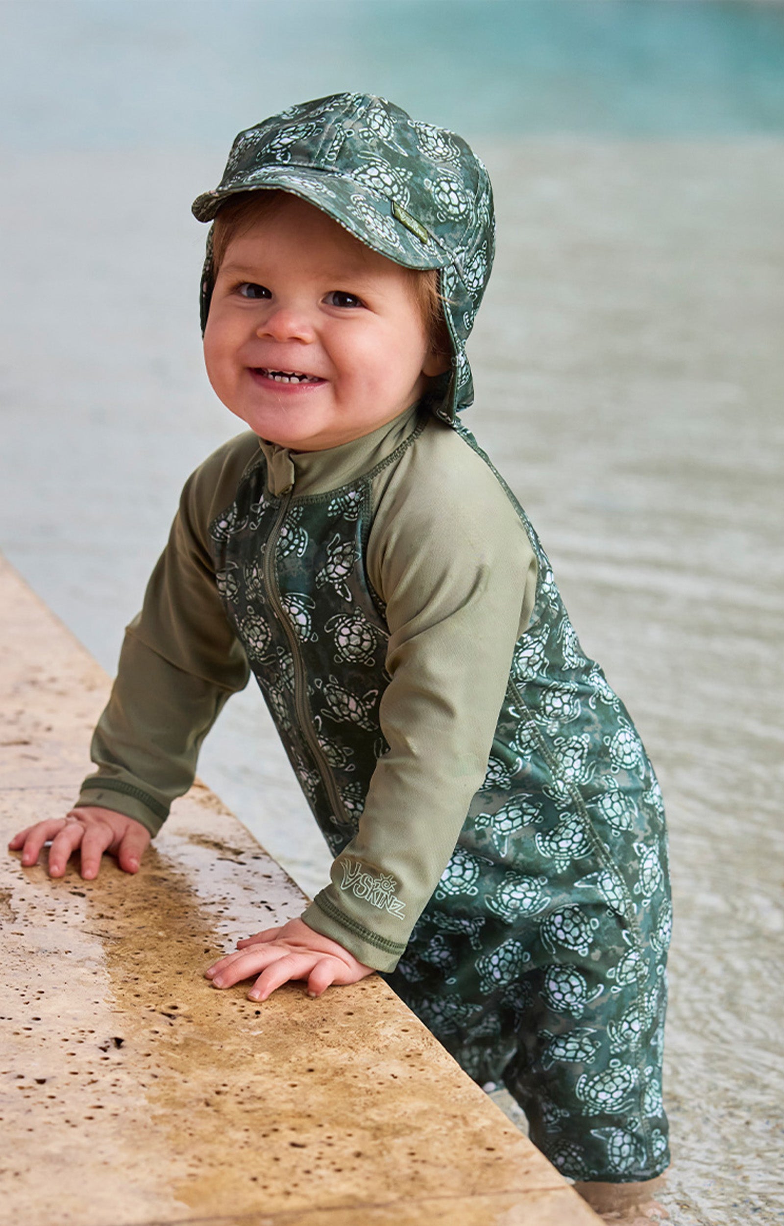 baby boy swimming in swim flap hat|turtle-cove